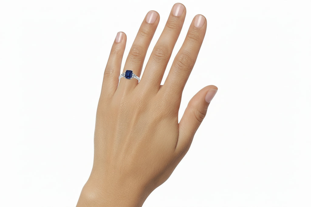 Emerald-shape lab-grown Blue Sapphires (5 ct. t.w.) and round-shape lab-grown white sapphires (3/8 ct. t.w.) set